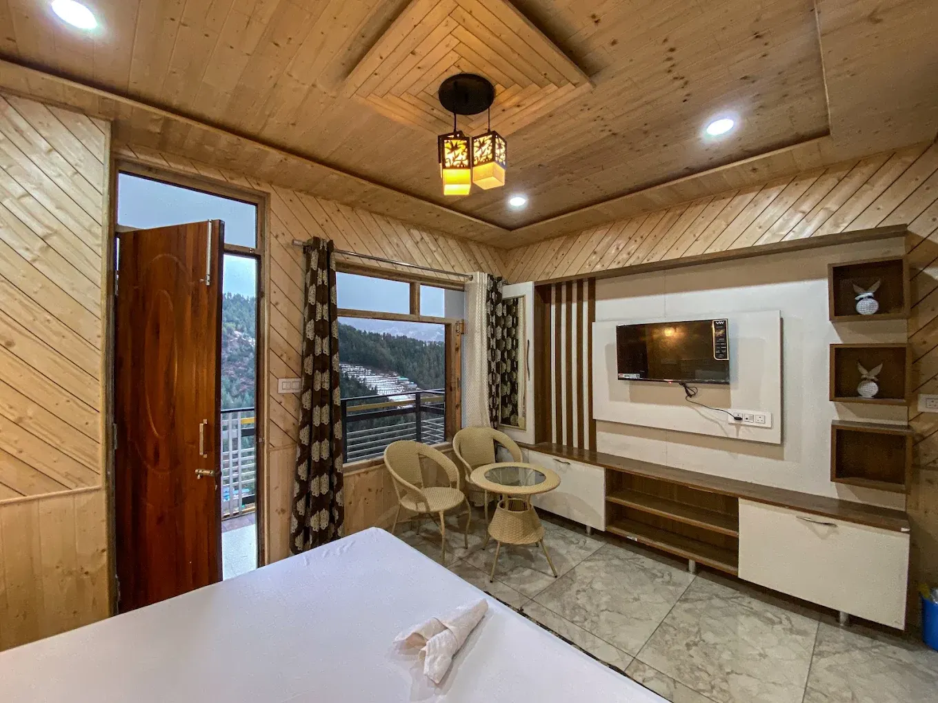 Panoramic mountain view from the balcony at Alpine Crest Homestay